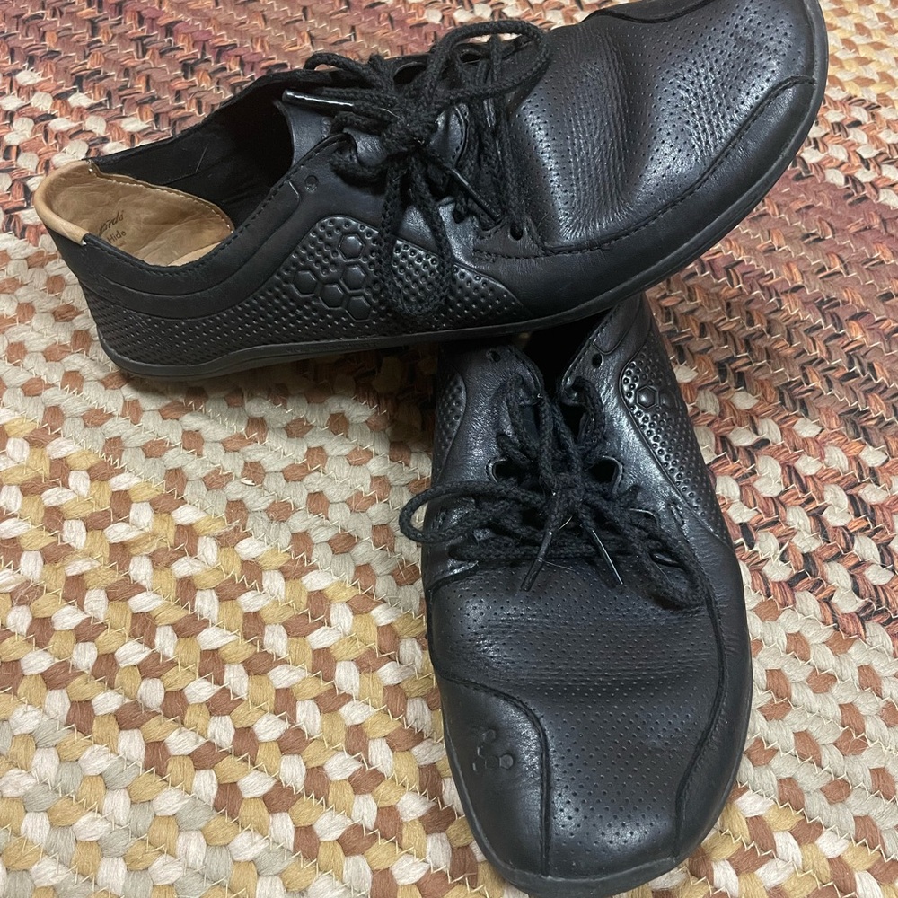 Vivo Barefoot Black Athletic Shoes with Sleek Design
